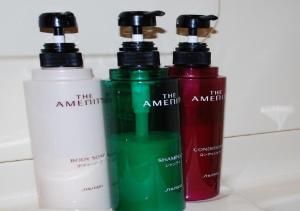 a group of three bottles sitting on a counter at skyhotel uozu / Vacation STAY 59595 in Uozu