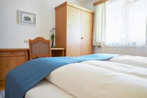 Łóżko lub łóżka w pokoju w obiekcie Haus Elfi Fiegl