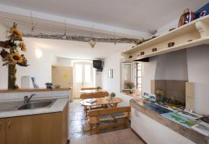 Kuchyň nebo kuchyňský kout v ubytování Apartments Mirakul