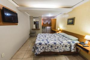 Postel nebo postele na pokoji v ubytování Solar Hotel
