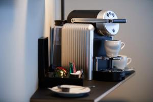 Set per la preparazione di tè e caffè presso Boutique Hotel Josef