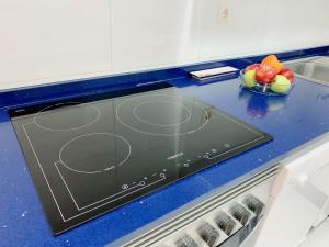 Kuchyň nebo kuchyňský kout v ubytování Apartamento Nuevo con Gran Terraza y Wifi en Canet