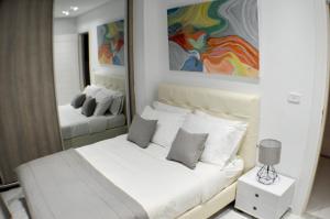Gulta vai gultas numurā naktsmītnē Cosy Apartment in La Marsa - 2 bed 1 Bath