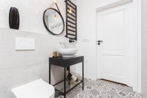 Kúpeľňa v ubytovaní City of the Kings - Nubium Apartment