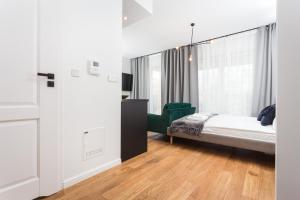 Posteľ alebo postele v izbe v ubytovaní City of the Kings - Nubium Apartment