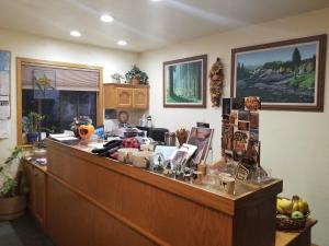 a cashier counter in a room with at Lazy J Ranch Motel in Three Rivers