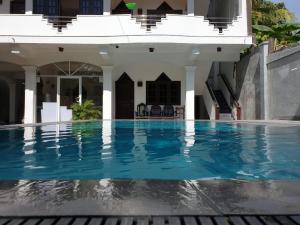 Bazén v ubytování Villa Goodwill Paradise nebo v jeho okolí