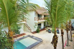 Bazén v ubytování Hotel Boutique La Puerta Azul Beachfront - Adults Only nebo v jeho okolí