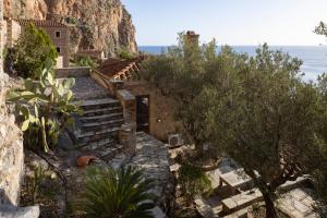 a stone house with a view of the ocean at Victoria's House in Monemvasia Castle in Monemvasia