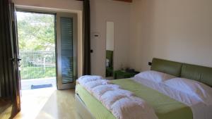 Postel nebo postele na pokoji v ubytování B&B Oasi Vetoio