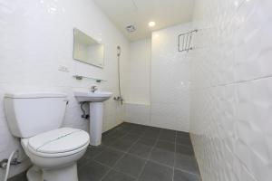 Koupelna v ubytování Guo Chen Hotel