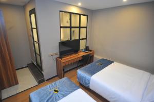 Katil atau katil-katil dalam bilik di Skye Hotel Sunway