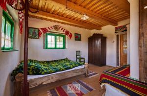 Postel nebo postele na pokoji v ubytování Casa Glod