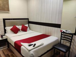 Postel nebo postele na pokoji v ubytování Hotel Happyland