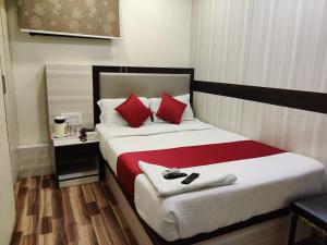 Postel nebo postele na pokoji v ubytování Hotel Happyland