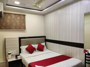 Postel nebo postele na pokoji v ubytování Hotel Happyland