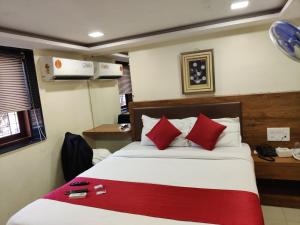 Postel nebo postele na pokoji v ubytování Hotel Happyland