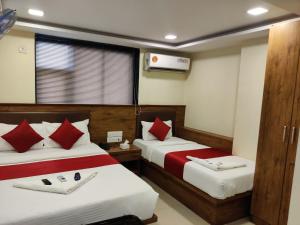 Postel nebo postele na pokoji v ubytování Hotel Happyland