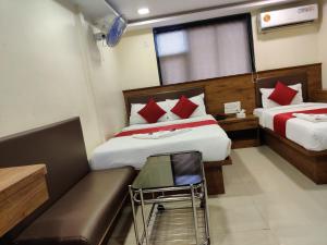 Postel nebo postele na pokoji v ubytování Hotel Happyland