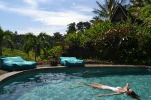 Bazén v ubytování Bali Lush nebo v jeho okolí
