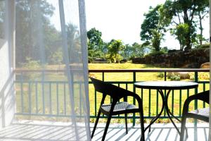 Balkón nebo terasa v ubytování Katathong Golf Resort & Spa