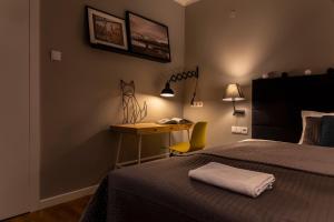 Posteľ alebo postele v izbe v ubytovaní Apartamenty Koci Ogon