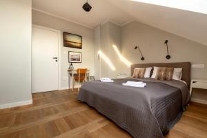 Posteľ alebo postele v izbe v ubytovaní Apartamenty Koci Ogon + 37 fotografií