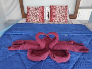 Letto o letti in una camera di Sea Front Beach Huts