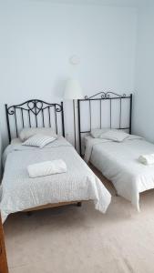 Posteľ alebo postele v izbe v ubytovaní Comunidad Casa N
