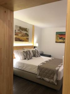 a bedroom with a large bed in a room at Acrotel Sofia's Guest House in Sidherás +40 photos