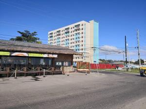 a building on the side of a street with a building at 426 Anabelle Residence at Marina Spatial Condominium in Dumaguete