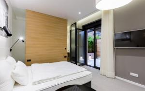 Кровать или кровати в номере Teanna Lux Apartments