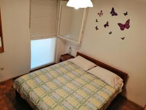 Łóżko lub łóżka w pokoju w obiekcie Apartment Pula