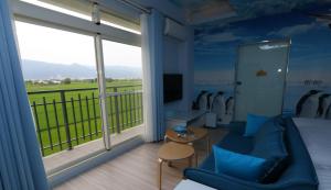 Posezení v ubytování Wunan Zoo Family Homestay