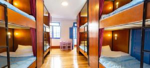 Letto o letti in una camera di Granada Hostel