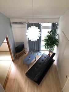 Ruang duduk di It's Kasuga Town B Building / Vacation STAY 60078