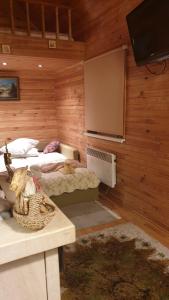 Säng eller sängar i ett rum på Jurmala's Center Eco House
