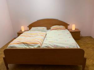 Postel nebo postele na pokoji v ubytování Apartma Vita