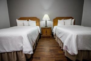 Postel nebo postele na pokoji v ubytování Hotel Posada Tierra Blanca