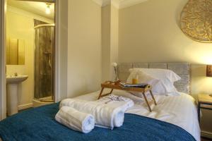 Postel nebo postele na pokoji v ubytování Sunnydale Serviced Apartments - Central Wakefield, spacious apartment