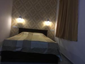 Postel nebo postele na pokoji v ubytování Sea Sands Beach Hostel