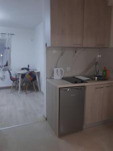 Η κουζίνα ή μικρή κουζίνα στο Apartman Mango Banja Luka center hospital Free parking