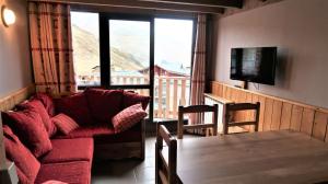 Ruang duduk di Silveralpes Locations - appartement Montreuil Val-Thorens