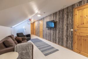 Posezení v ubytování Miekojärvi Resort