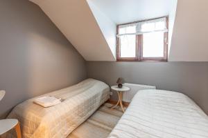 Postel nebo postele na pokoji v ubytování Miekojärvi Resort