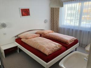 Postel nebo postele na pokoji v ubytování Haus Apollo