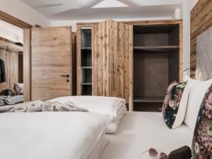 Posteľ alebo postele v izbe v ubytovaní Platzhirsch Apart & Mayrhofen