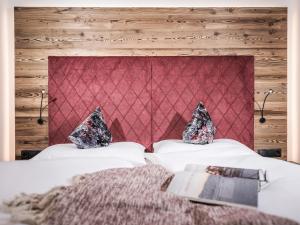 Posteľ alebo postele v izbe v ubytovaní Platzhirsch Apart & Mayrhofen