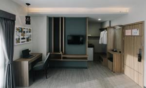 TV a/nebo společenská místnost v ubytování Arista Hotel Ubon