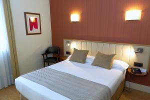 
Cama o camas de una habitación en Hotel Los Condes
